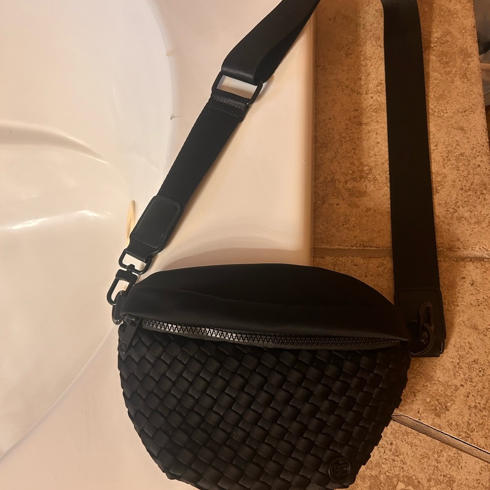 Black Woven Leather Shoulder Bag with Structured Design